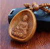 porte-clefs-bouddha-en-bois-de-pecher