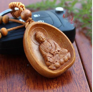 porte-clefs-bouddha-en-bois-de-pecher